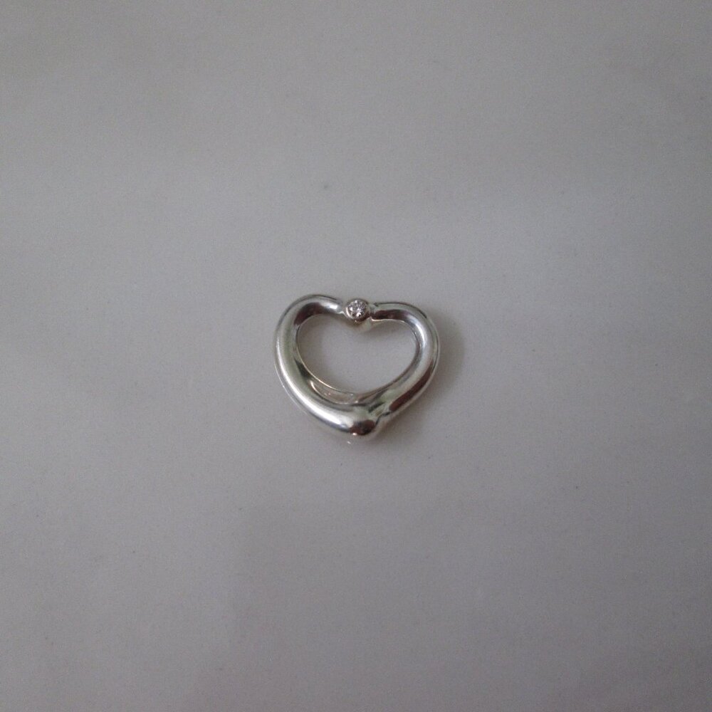 Tiffany & Co. 925 sterling silver Elsa Peretti  open heart 2 diamonds pendant.